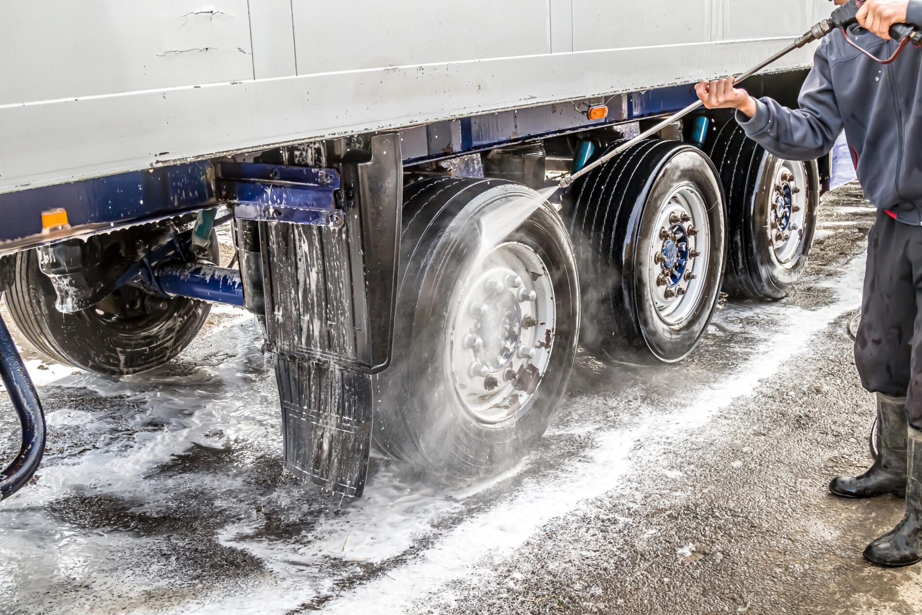 Washing a truck outdoors. Close-up. Car wash with detergents.